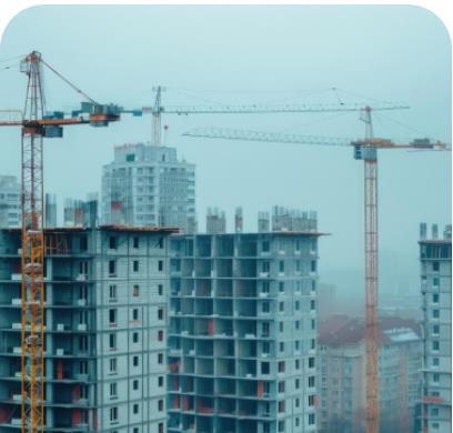 Concrete tower construction with cranes